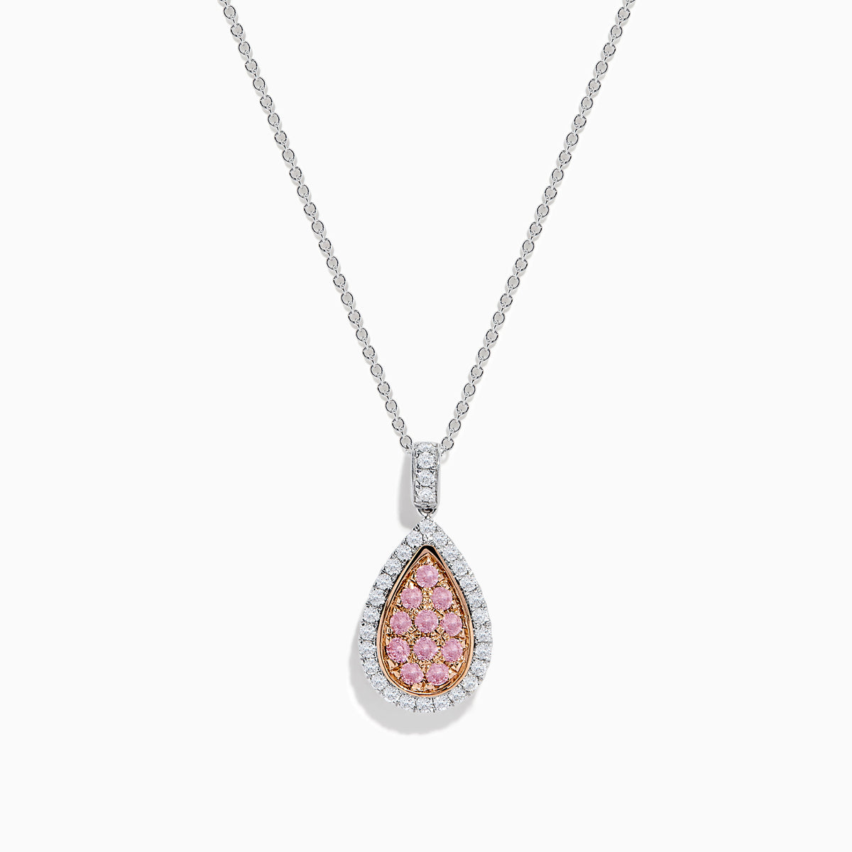 A 14K two tone gold pendant with a teardrop-shaped design, featuring pink and white diamonds at the center and surrounded by clear stones, hanging on a silver chain necklace.