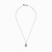 A 14K two tone gold pendant with a teardrop-shaped design, featuring pink and white diamonds at the center and surrounded by clear stones, hanging on a silver chain necklace.