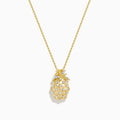 The Novelty 14K Yellow Gold Diamond Pineapple Pendant features a delicate gold chain and crisscrossed white gemstones, creating a charming accent against a white background.