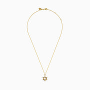 The 14K Yellow Gold Diamond Star of David Pendant features a shining diamond centerpiece and sparkling gemstones along the edges, set on a classic gold chain.
