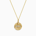 The Novelty 14K Yellow Gold Diamond Evil Eye Pendant features a round design with a raised sunburst and eye motif, accented by sparkling diamonds—an elegant twist on classic evil eye jewelry.
