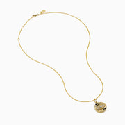 The Novelty 14K Yellow Gold Diamond Evil Eye Pendant features a round design with a raised sunburst and eye motif, accented by sparkling diamonds—an elegant twist on classic evil eye jewelry.