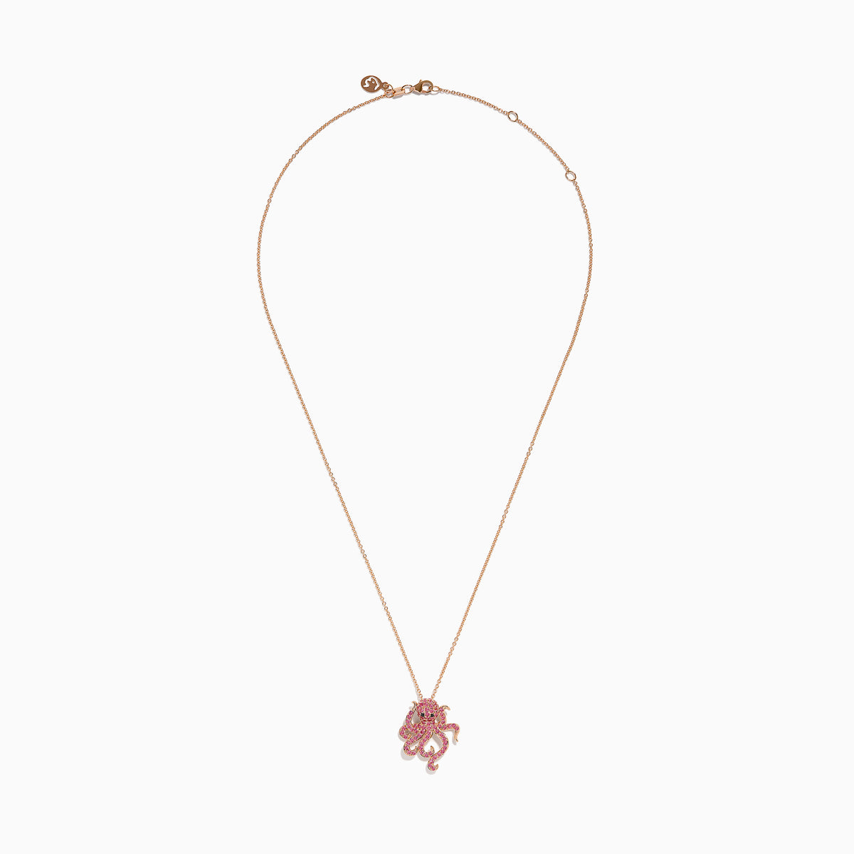 The 14K Rose Gold Pink Sapphire and Black Diamond Pavé Octopus Pendant features a body and tentacles adorned with pink sapphires, shown against a white background.