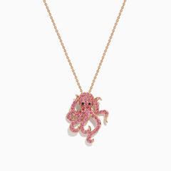 The 14K Rose Gold Pink Sapphire and Black Diamond Pavé Octopus Pendant features a body and tentacles adorned with pink sapphires, shown against a white background.
