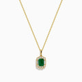 The 14K Yellow Gold Emerald and Diamond Halo Pendant features a rectangular green emerald, surrounded by round and baguette diamonds in a halo setting, all centrally suspended from a delicate gold chain.