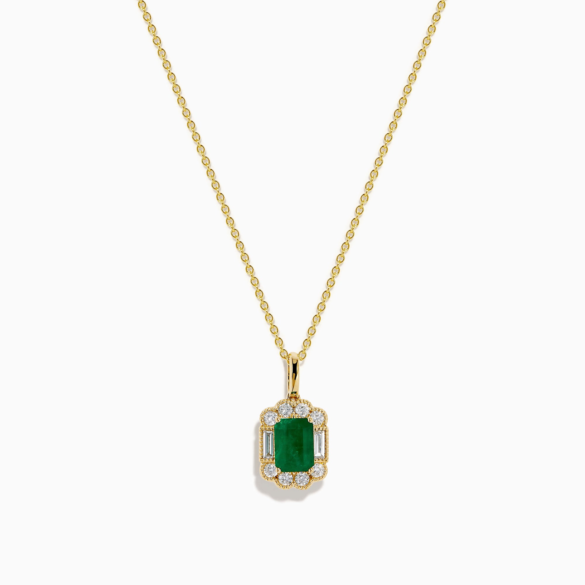 The 14K Yellow Gold Emerald and Diamond Halo Pendant features a rectangular green emerald, surrounded by round and baguette diamonds in a halo setting, all centrally suspended from a delicate gold chain.