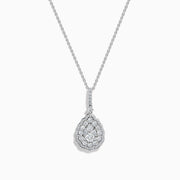 A 14K White Gold Diamond Pear Cluster Pendant featuring a delicate chain and a teardrop-shaped pendant adorned with sparkling diamonds in a floral pattern.