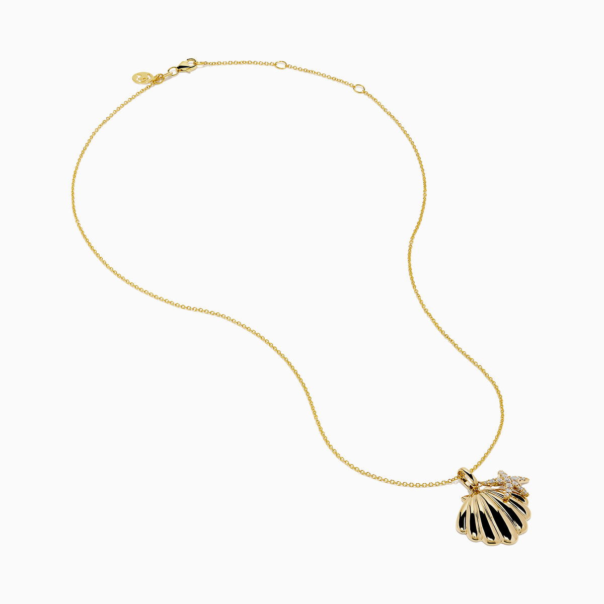 The 14K Yellow Gold Diamond Scallop Shell and Starfish Duo Pendant features a scallop shell and diamond-studded starfish on a fine gold chain, displayed against a white background.