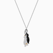 The Seaside 14K Two Tone Gold Diamond Penguin Pendant features black, white, and gold accents with sparkling diamond details for a charming look. Photographed against a plain white background.