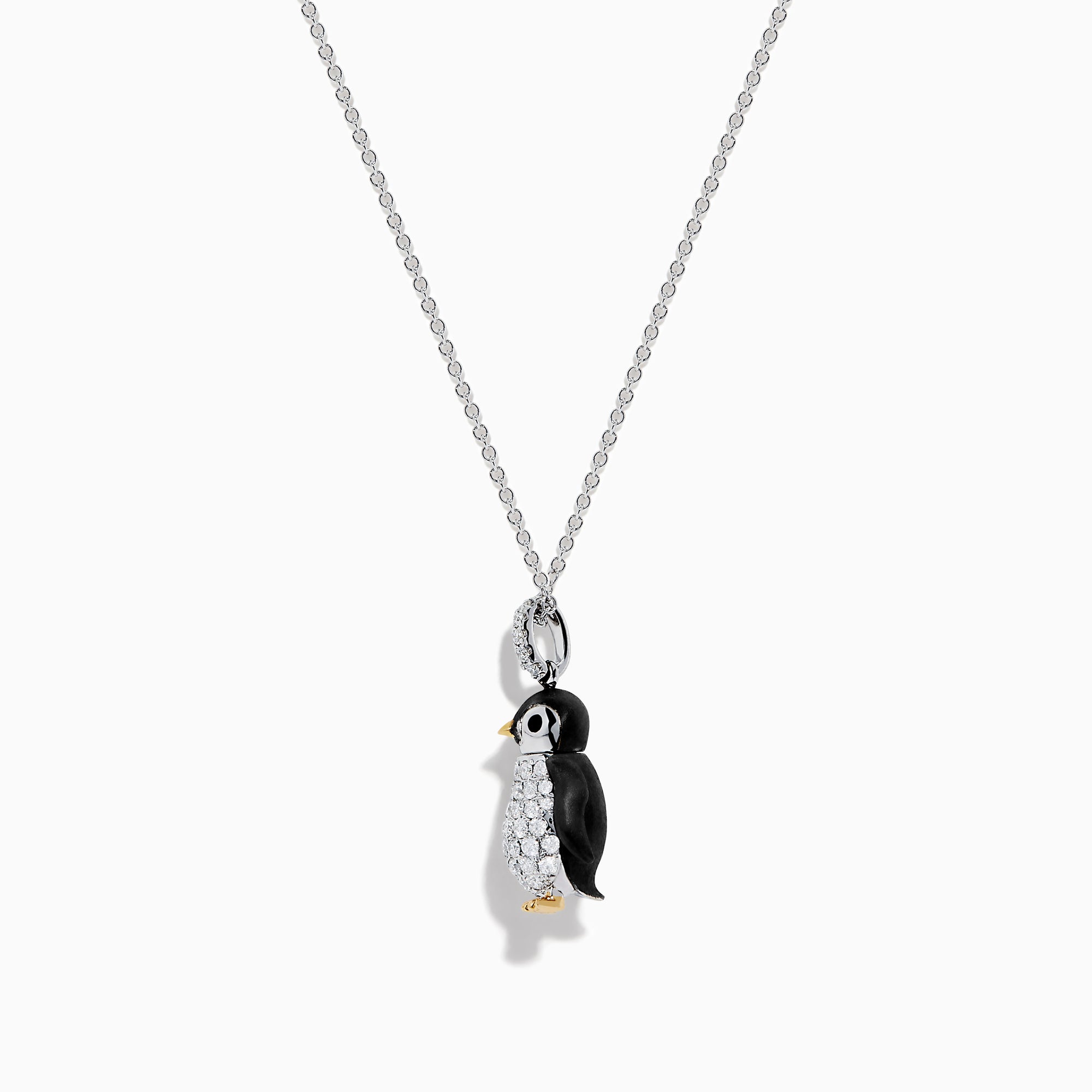 The Seaside 14K Two Tone Gold Diamond Penguin Pendant features black, white, and gold accents with sparkling diamond details for a charming look. Photographed against a plain white background.