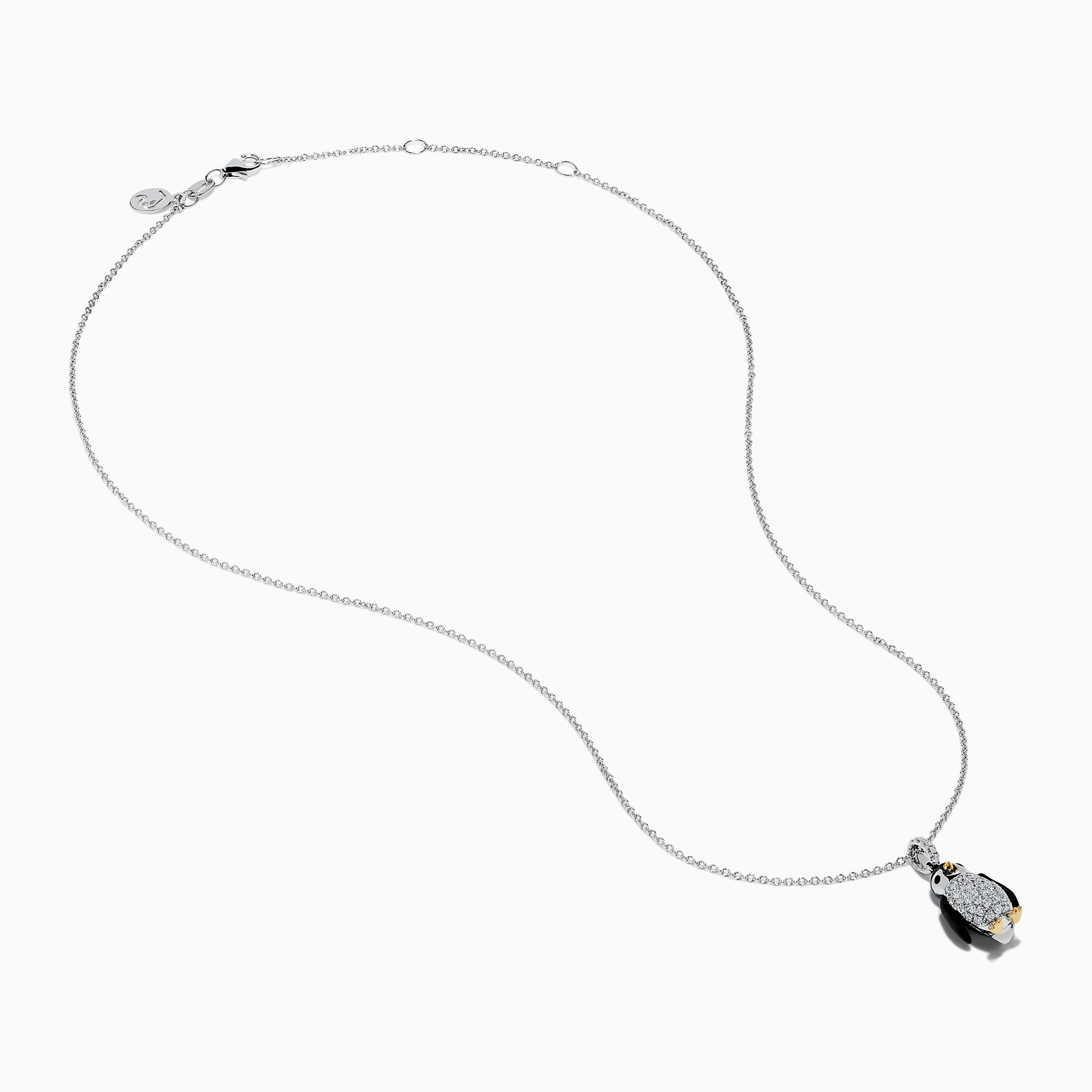 The Seaside 14K Two Tone Gold Diamond Penguin Pendant features black, white, and gold accents with sparkling diamond details for a charming look. Photographed against a plain white background.