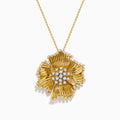 The D'Oro 14K Yellow Gold Diamond Flower Pendant features textured petals and clusters of sparkling diamonds at the center and edges, suspended from a delicate gold chain.