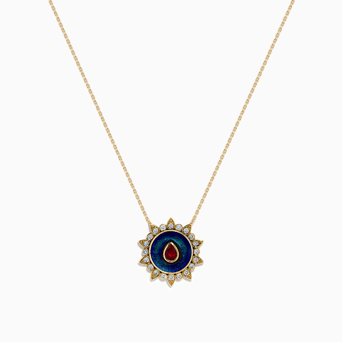 14K Yellow Gold Ruby, Diamond, and Enamel Pendant featuring a delicate gold chain, round pendant with blue and green enamel, a central ruby teardrop, and a sunburst of small clear stones.