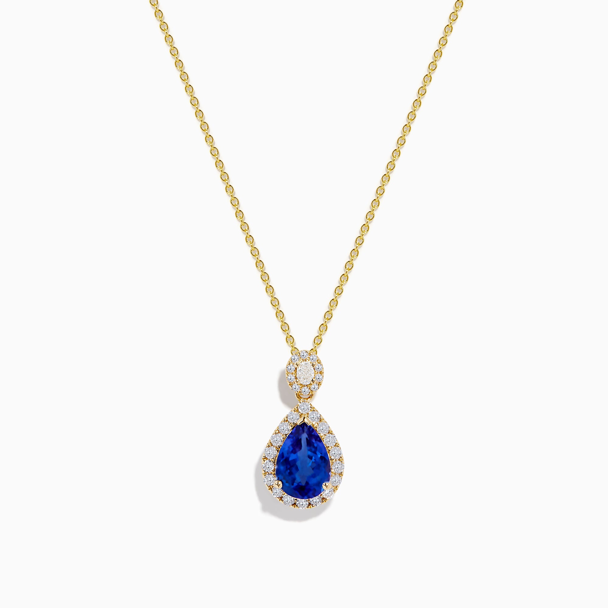 The Nahla Siri 14K Yellow Gold Tanzanite and Diamond Pendant features a teardrop blue tanzanite surrounded by white diamonds, plus a circular diamond accent above the main stone.