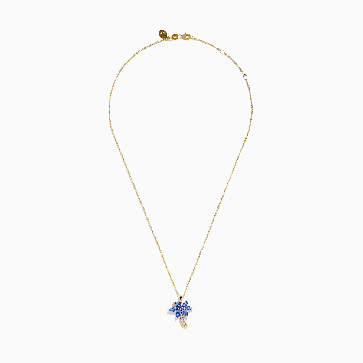 The Nahla Siri 14K Yellow Gold Tanzanite and Diamond Palm Tree Pendant features marquise-cut blue tanzanite leaves and sparkling diamonds accenting the curved trunk for added brilliance.