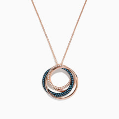 The 14K Rose Gold Blue and White Diamonds Circle Pendant showcases three interlocking circles, with two adorned by sparkling blue and white diamonds, beautifully presented against a white background.