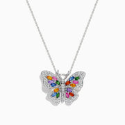 The Watercolors 14K Gold Multi Sapphire & Diamond Butterfly Pendant is a gold necklace with a butterfly design, sparkling diamonds, and colorful sapphires in green, blue, pink, red, orange, and purple on its wings.