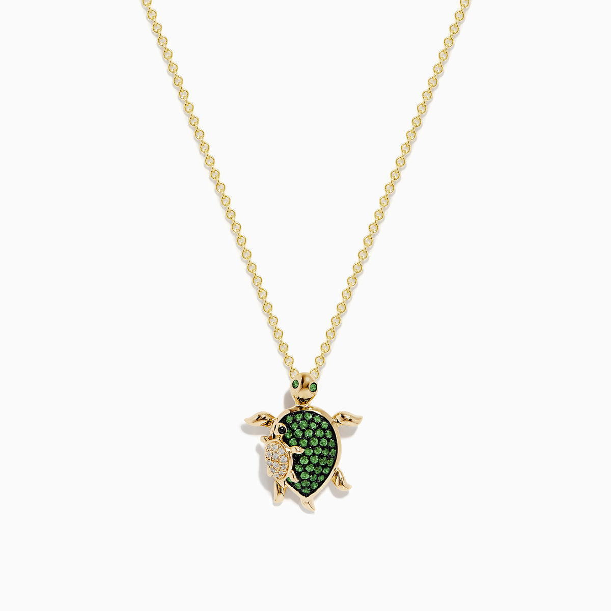 The Seaside 14K Yellow Gold Tsavorite and Diamond Turtle Pendant showcases a large turtle with a tsavorite shell and a smaller diamond-encrusted turtle, both suspended from a delicate gold chain.