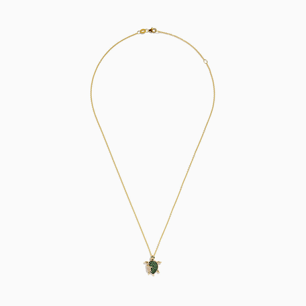 The Seaside 14K Yellow Gold Tsavorite and Diamond Turtle Pendant showcases a large turtle with a tsavorite shell and a smaller diamond-encrusted turtle, both suspended from a delicate gold chain.
