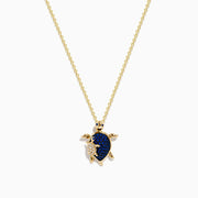 Seaside 14K Yellow Gold Blue Sapphire and Diamond Turtle Pendant showcased on a white background, featuring a turtle with a sapphire-studded shell and gold accents on its head, legs, and flipper.