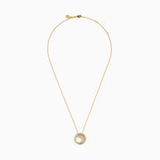 The D'Oro 14K Yellow Gold Diamond Swirl Pendant features a circular design with two intertwined loops—one in polished gold, the other adorned with sparkling diamonds.