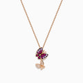 A 14K rose gold pendant featuring two butterfly charms—one with pink sapphire and purple gemstones, the other with sparkling diamonds—displayed on a white background.