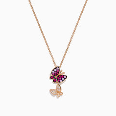 A 14K rose gold pendant featuring two butterfly charms—one with pink sapphire and purple gemstones, the other with sparkling diamonds—displayed on a white background.