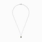 The Brasilica 14K White & Yellow Gold Emerald and Diamond Pendant features a teardrop-shaped emerald framed by double halos of white and yellow diamonds on a silver chain.
