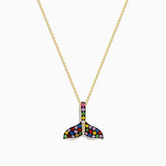 The Watercolors 14K Yellow Gold Multi Sapphire and Diamond Tail Pendant is a chain necklace with a whale tail design, featuring multicolored sapphires and diamonds set in a striking pattern, shown on a white background.