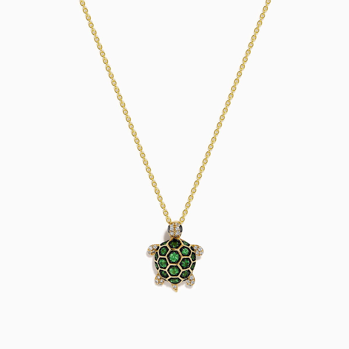 The 14K Yellow Gold Tsavorite and Diamond Turtle Pendant features a turtle-shaped design with a shell adorned in vibrant green tsavorites and sparkling diamonds on its head and feet, set against a plain white background.