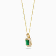 The Brasilica 14K Yellow Gold Emerald and Diamond Pendant showcases a rectangular emerald accented with sparkling diamonds, set against a plain white background.