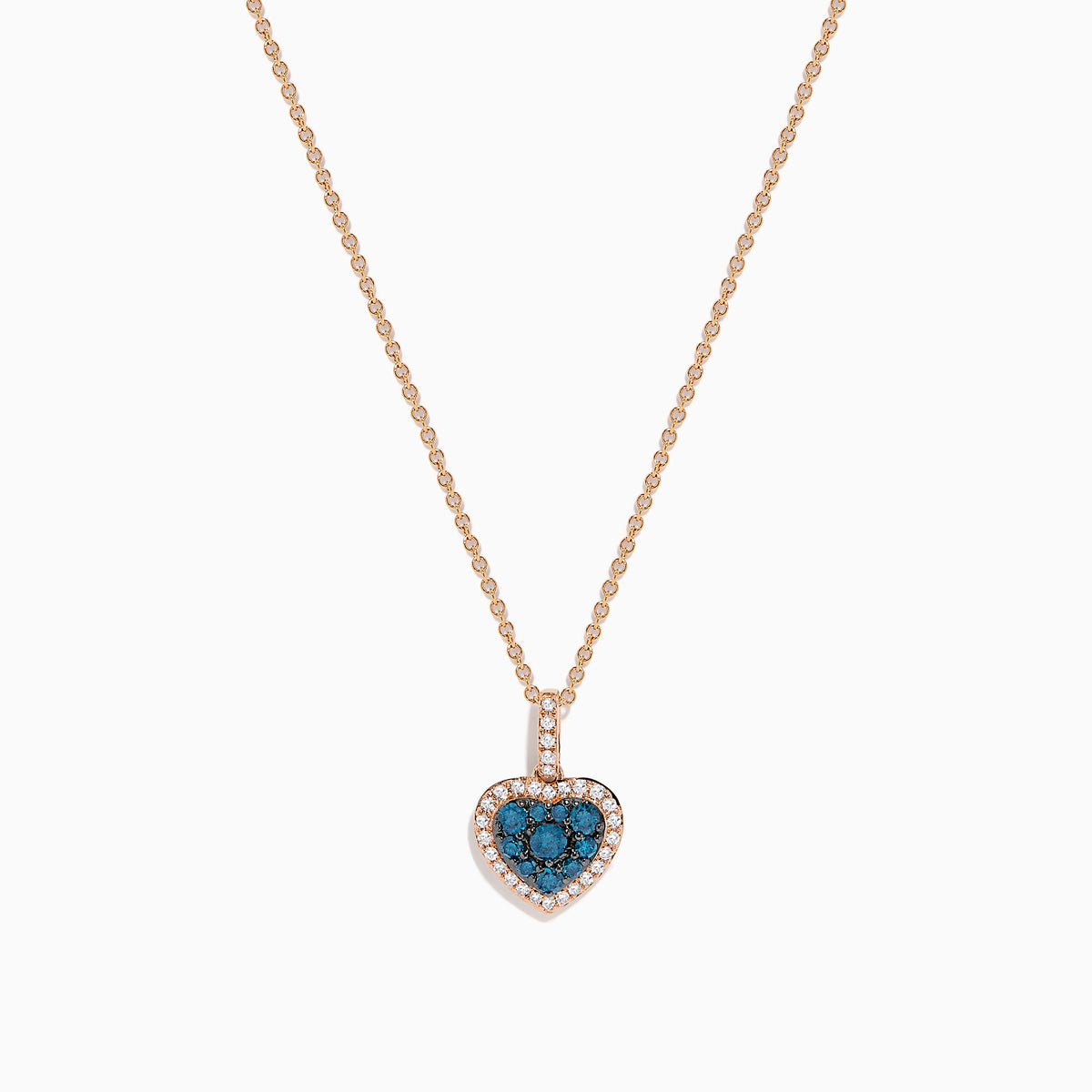 The Bella Bleu 14K Rose Gold Blue and White Diamond Heart Pendant features a heart-shaped design with blue diamonds at the center, bordered by white diamonds, hanging vertically on a rose gold chain against a white background.
