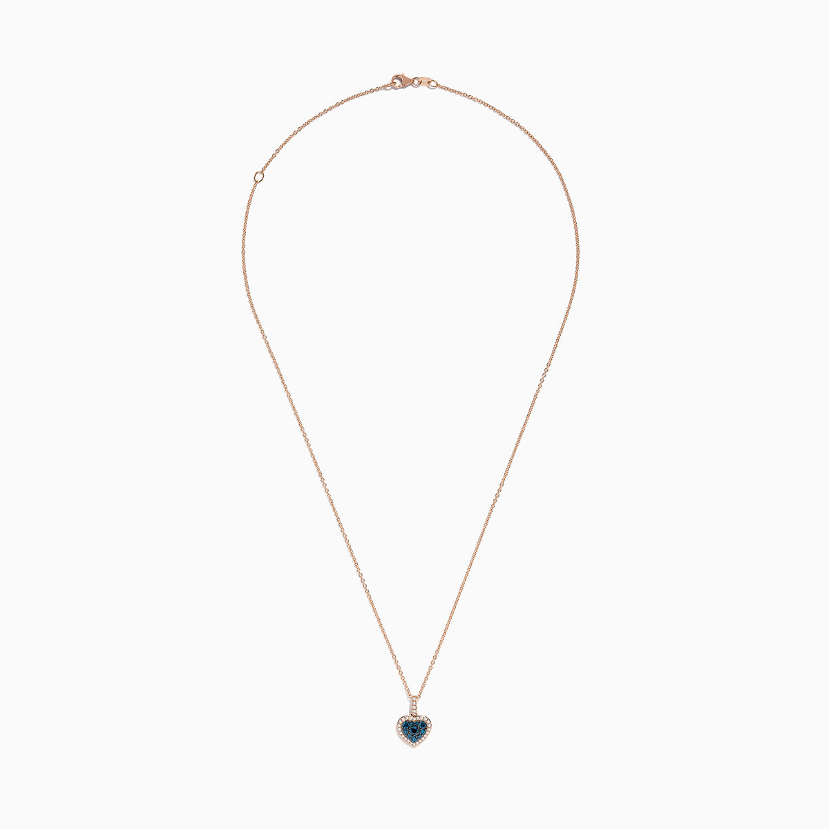 The Bella Bleu 14K Rose Gold Blue and White Diamond Heart Pendant features a heart-shaped design with blue diamonds at the center, bordered by white diamonds, hanging vertically on a rose gold chain against a white background.