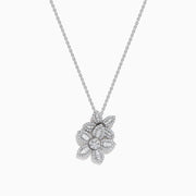The Nature 14K White Gold Diamond Flower Pendant features a bloom-shaped design with petal details encrusted in sparkling diamonds, elegantly suspended from a delicate chain—a stunning creation by Effy.
