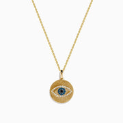 The Novelty 14K Yellow Gold Blue, White and Black Diamond Evil Eye Pendant features a striking eye design and sparkling diamonds—an eye-catching addition to any jewelry collection.