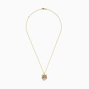 The Safari 14K Yellow Gold Diamond and Emerald Tiger Pendant features a tiger’s head with clear stones and green gemstone eyes, displayed on a white background.