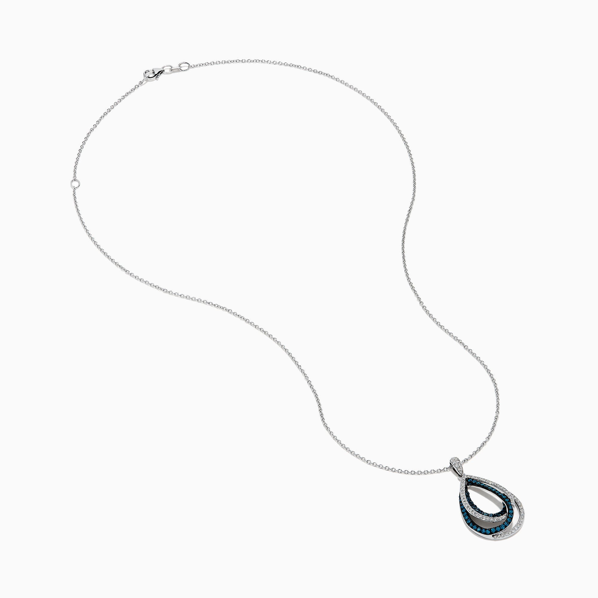 The 14K White Gold Blue and White Diamond Pear Crossover Pendant features blue and white diamonds in a swirling pattern, set on a delicate chain for a modern, intricate look.