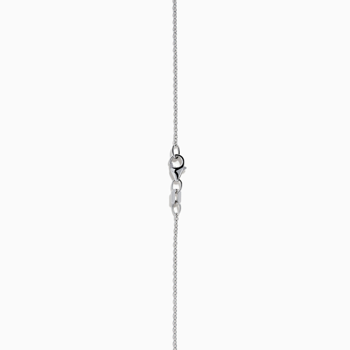 The 14K White Gold Blue and White Diamond Pear Crossover Pendant features blue and white diamonds in a swirling pattern, set on a delicate chain for a modern, intricate look.