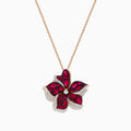 The Ruby Royale 14K Rose Gold Ruby and Diamond Flower Pendant showcases a rose gold chain with a flower-shaped design, featuring vibrant rubies, black stones, and sparkling diamonds at the center and petal edges.