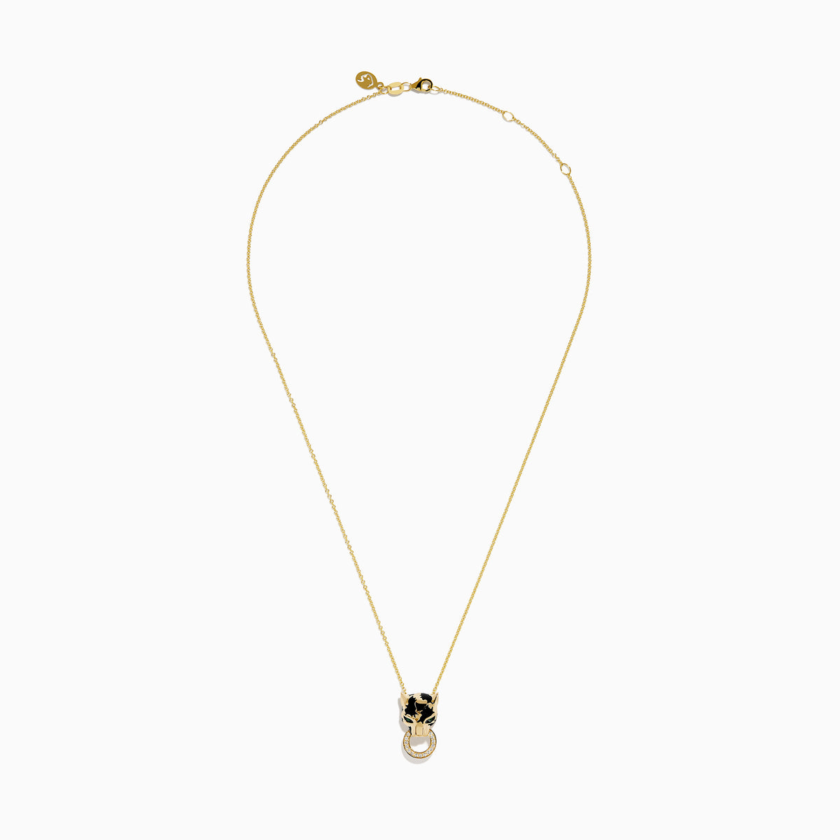 The Signature 14K Yellow Gold Diamond and Emerald Panther Pendant features a panther’s head with green gemstone eyes, black enamel detail, and a diamond-studded ring held in its mouth.