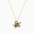 The Seaside 14K yellow gold turtle pendant features white, black, and brown diamonds for a sparkling, eye-catching look.