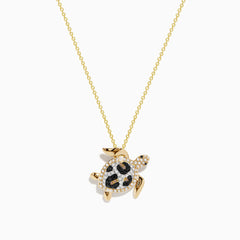 The Seaside 14K yellow gold turtle pendant features white, black, and brown diamonds for a sparkling, eye-catching look.