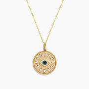 The Novelty 14K Yellow Gold White, Blue and Black Diamond Evil Eye Pendant features a round eye design at the center, highlighted by sparkling diamonds in white, blue, and black tones arranged in a circular pattern.