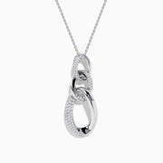 The Pave Classica 14K White Gold Diamond Interlocking Links Pendant features three oval links, two set with sparkling diamonds, hanging elegantly from a delicate white gold chain on a white background.