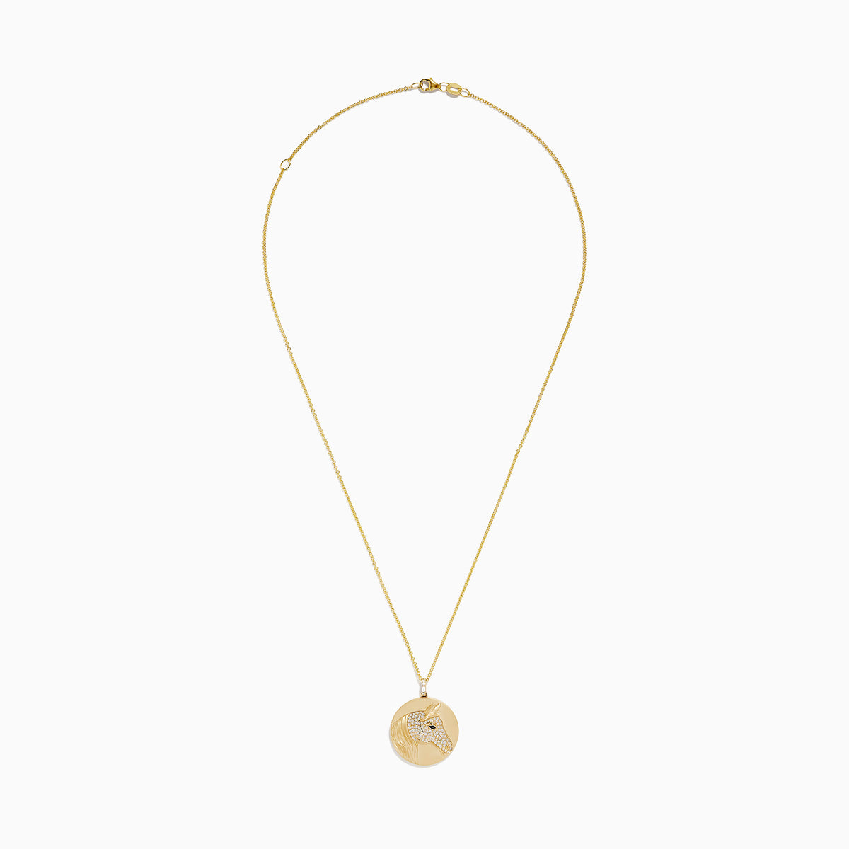 The Safari 14K Yellow Gold White and Black Diamond Horse Pendant features a round design with a horse’s head, accented by sparkling white and black diamonds for an elegant, detailed look.