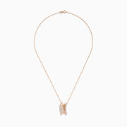 The Pave Rose 14k Textured Rose Gold Diamond Pendant features a curved, textured gold pendant with sparkling diamonds along the edges, displayed on a rose gold chain against a white background.