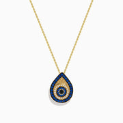 14K yellow gold chain necklace with an evil eye pendant featuring blue sapphire, black and white diamonds for a striking protective look, displayed on a white background.