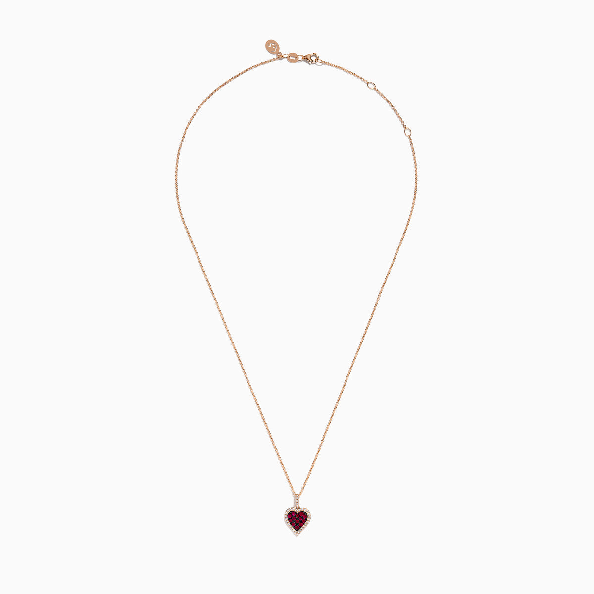 The Ruby Royale 14K Rose Gold Ruby and Diamond Heart Pendant features a ruby heart centerpiece, accented with dazzling diamonds on a rose gold chain.