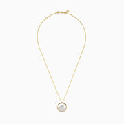 The Seaside 14K White & Yellow Gold Diamond Wave Pendant features a wave design encrusted with sparkling white stones, suspended on a gold chain necklace.