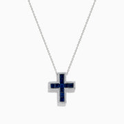 The Royale Bleu 14K White Gold Sapphire and Diamond Cross Pendant features deep blue sapphires and sparkling diamonds, elegantly displayed on a plain white background.